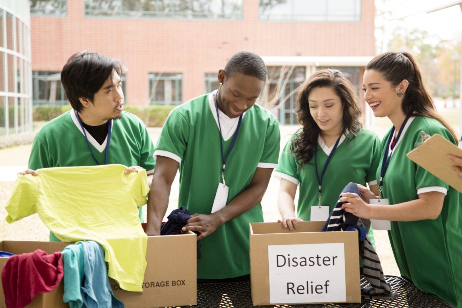 Group packaging clothes for charity donations